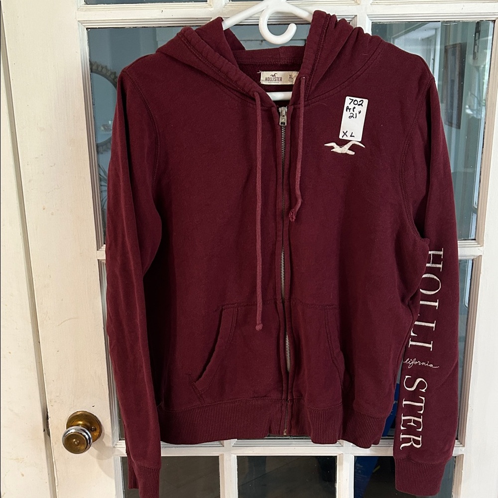 702.  Hollister Burgundy Zip-Up Hoodie